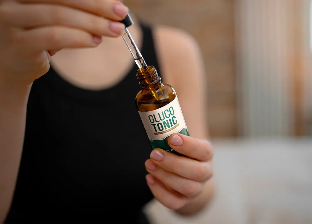 GlucoTonic Review – woman using blood sugar supplement drops daily
